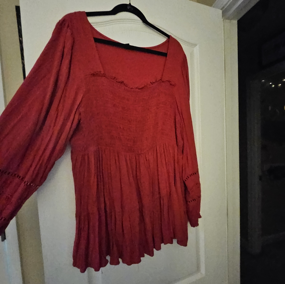 Long sleeve red peplum top from Torrid.